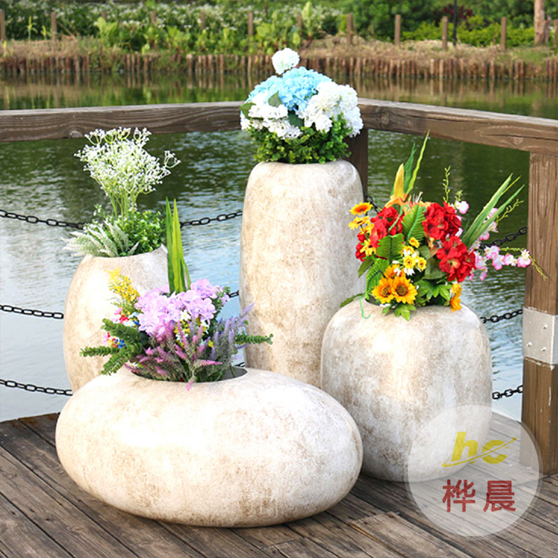 安徽合肥商業(yè)廣場美陳裝飾創(chuàng)意玻璃鋼花盆休閑椅