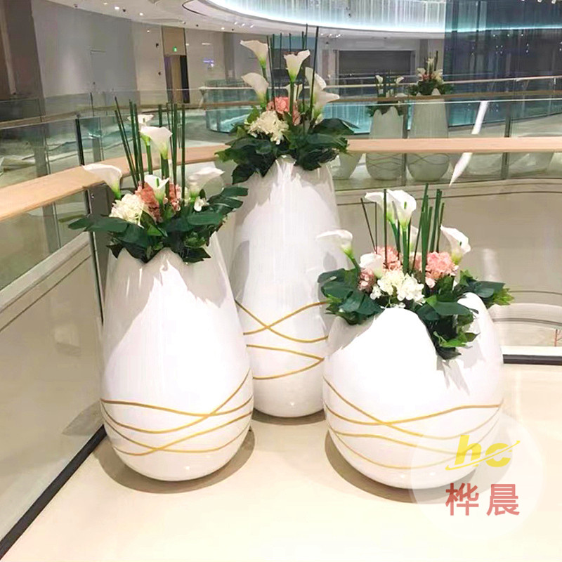 玻璃鋼創(chuàng)意組合花盆裝飾黑龍江綏化大型商場(chǎng)環(huán)境